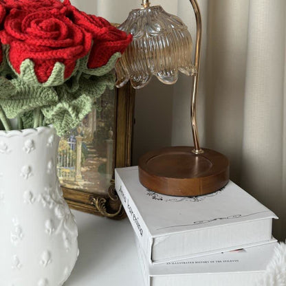 Ornement tissé à la main avec un bouquet de roses lumineuses