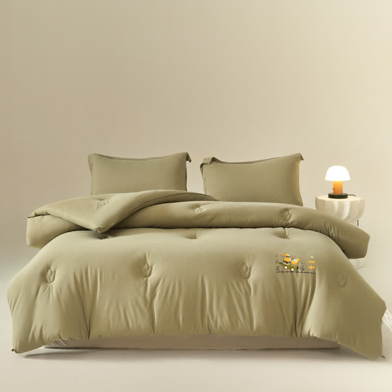 Couette douce et respirante en coton uni