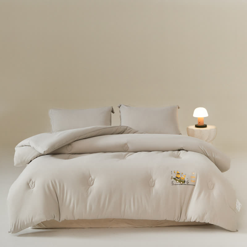 Couette douce et respirante en coton uni