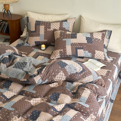 Parure de lit patchwork en gaze de coton à motifs géométriques (4 pièces)