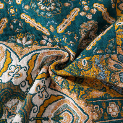 Couverture à pompons réversible en gaze de coton marocaine