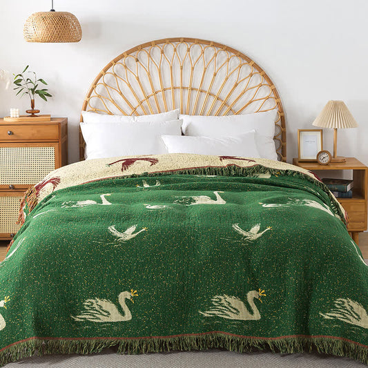Élégante couette réversible en gaze de coton d'oie avec pompons