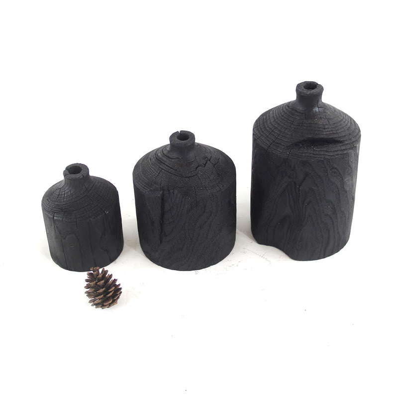 Vase décoratif en bois noir
