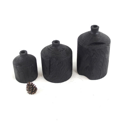 Vase décoratif en bois noir