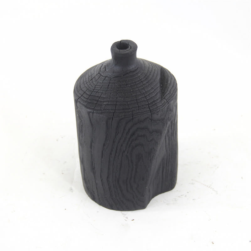 Vase décoratif en bois noir