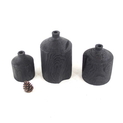 Vase décoratif en bois noir