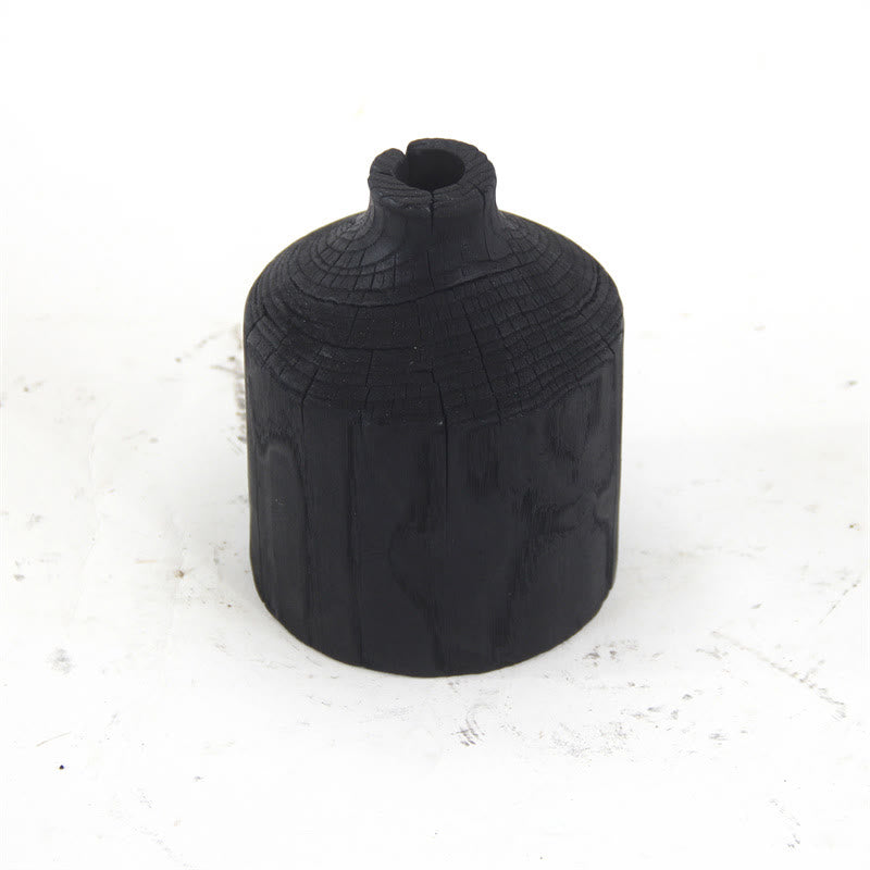 Vase décoratif en bois noir