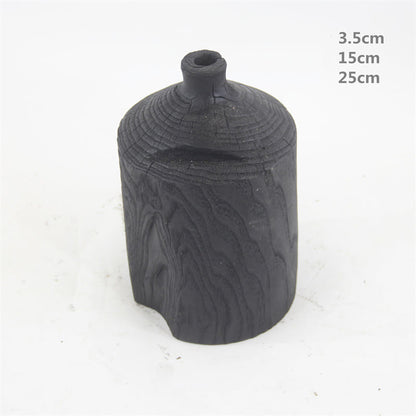 Vase décoratif en bois noir