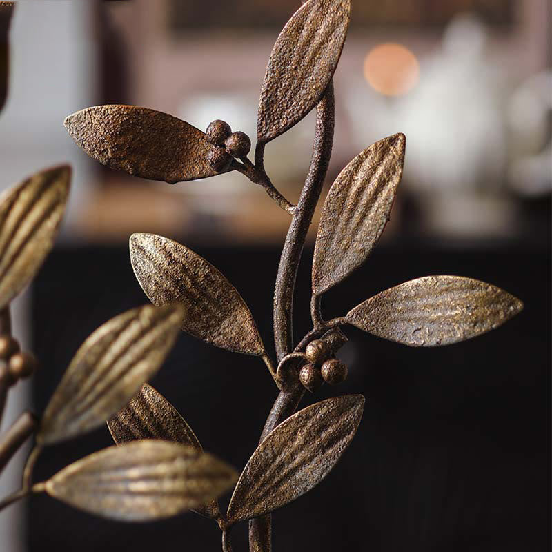 Bougeoir en fer avec motif de plantes et de fleurs