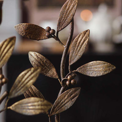 Bougeoir en fer avec motif de plantes et de fleurs