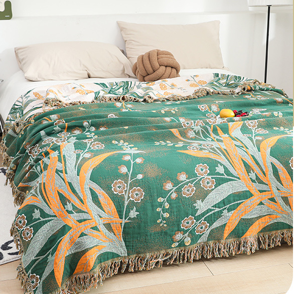 Couette réversible en gaze de coton avec pompons et rafraîchisseur en forme d'herbe