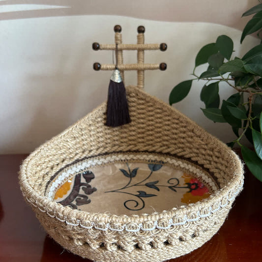 Panier de rangement tissé à la main avec motif botanique