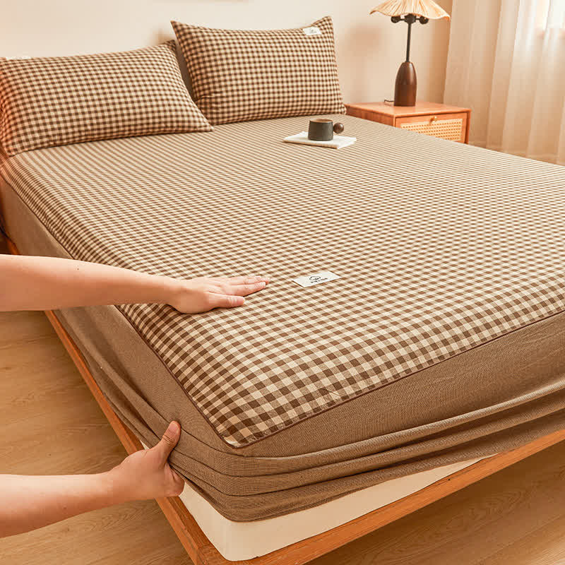 Drap-housse doux en pur coton avec un motif à carreaux simple
