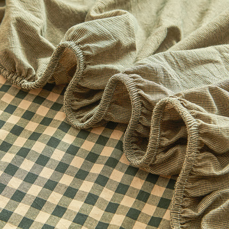 Drap-housse doux en pur coton avec un motif à carreaux simple