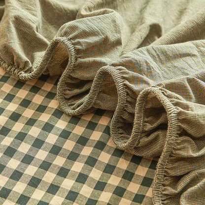 Drap-housse doux en pur coton avec un motif à carreaux simple