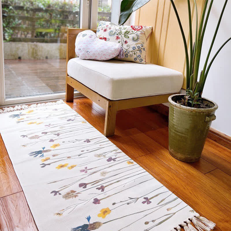Tapis de sol en coton et lin avec motif de branches de plantes et pompon