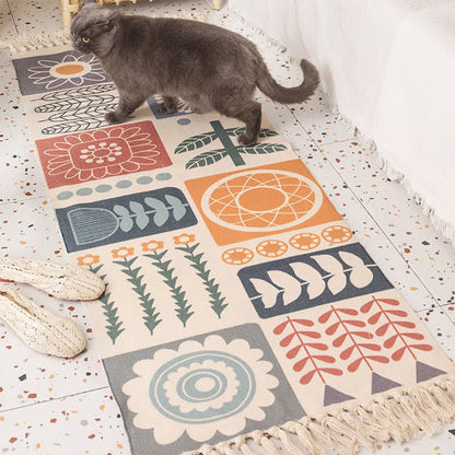 Tapis de sol en coton et lin avec motif de branches de plantes et pompon