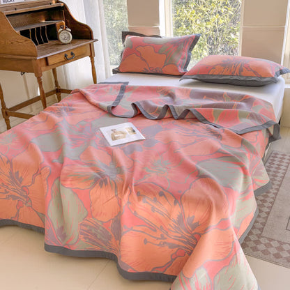 Couette légère en pur coton avec un motif floral lumineux