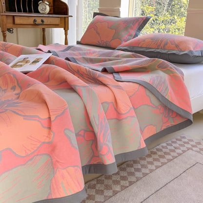 Couette légère en pur coton avec un motif floral lumineux