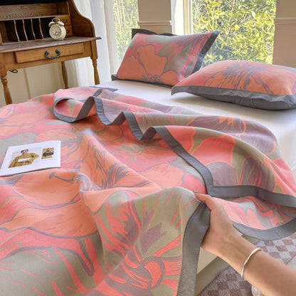 Couette légère en pur coton avec un motif floral lumineux