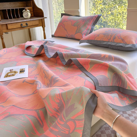 Couette légère en pur coton avec un motif floral lumineux