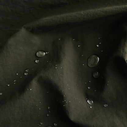Gilet uni, tablier imperméable