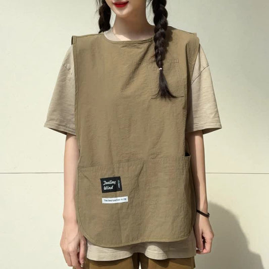 Gilet uni, tablier imperméable