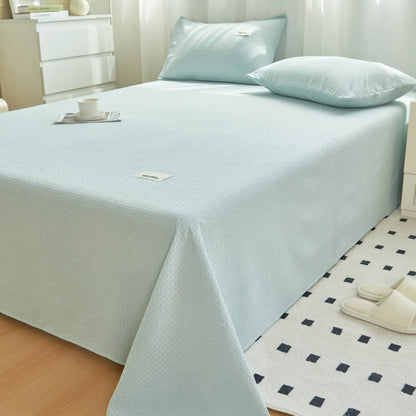Couette en coton uni à structure gaufrée