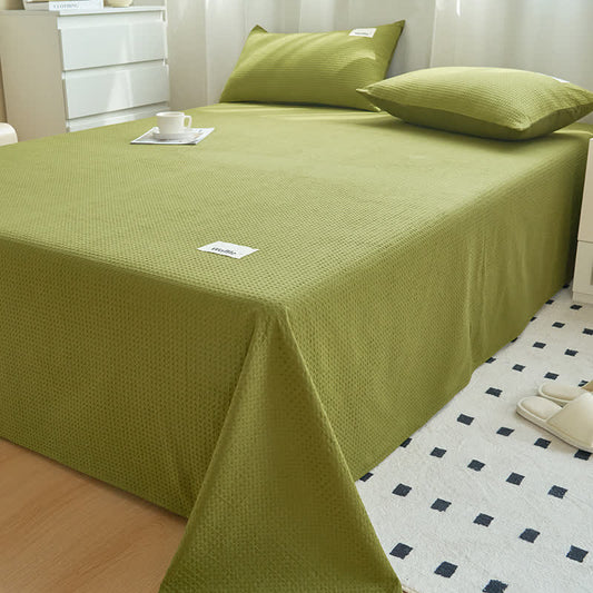 Couette en coton uni à structure gaufrée
