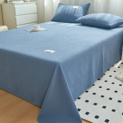 Couette en coton uni à structure gaufrée