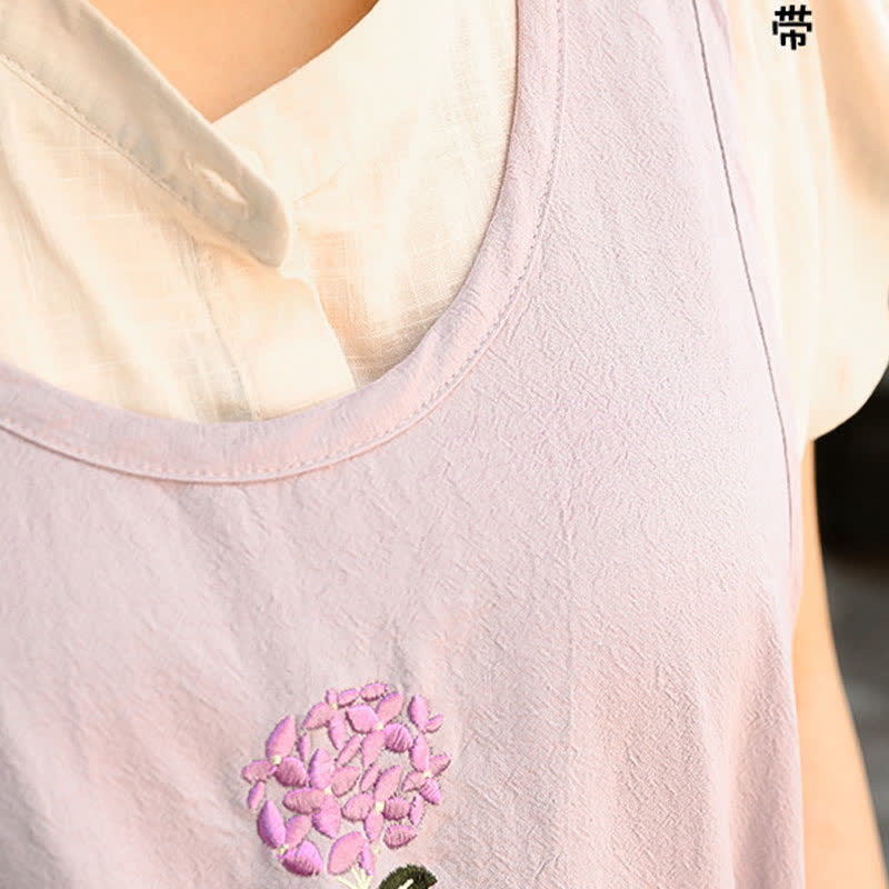 Tablier en coton fin et respirant avec broderie florale