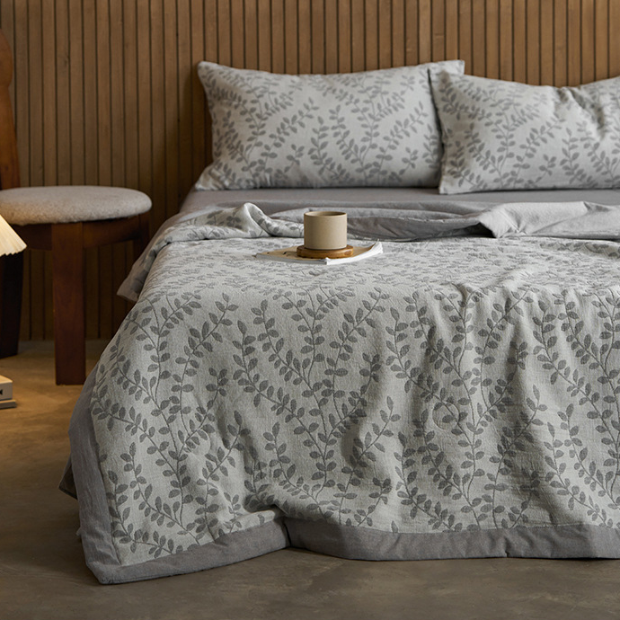 Linge de lit en gaze de coton à trois couches avec motif de feuilles jacquard