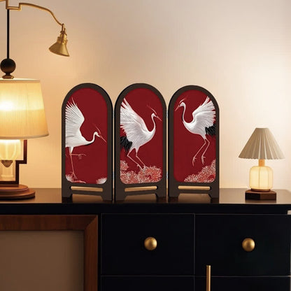 Paravent pliable avec grue à couronne rouge