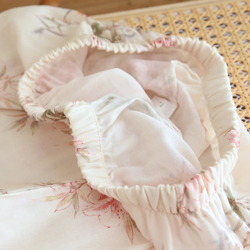 Vêtements de détente élégants avec branches et feuilles de cerisier
