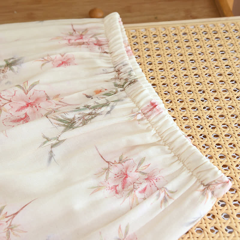 Vêtements de détente élégants avec branches et feuilles de cerisier