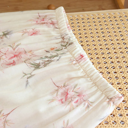 Vêtements de détente élégants avec branches et feuilles de cerisier