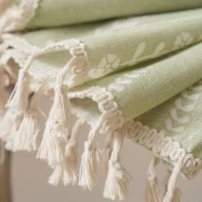 Rideau transparent rustique avec motif floral et feuilles et pompons incurvés