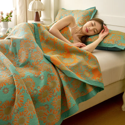 Couette réversible en gaze de coton teint en fil avec motif marguerite
