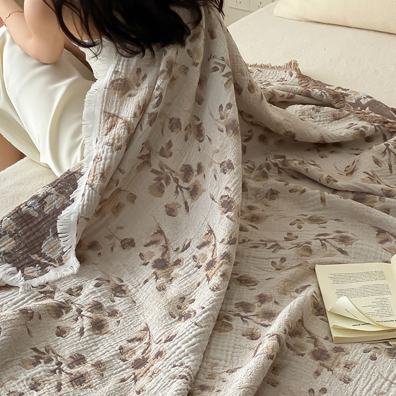 Couette réversible en gaze de coton avec motif floral vintage et pompons