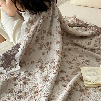 Couette réversible en gaze de coton avec motif floral vintage et pompons