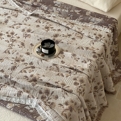 Couette réversible en gaze de coton avec motif floral vintage et pompons