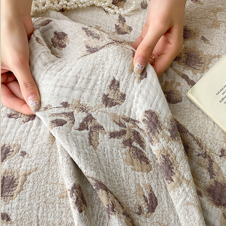Couette réversible en gaze de coton avec motif floral vintage et pompons