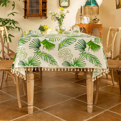 Nappe douce avec pompons en feuilles tropicales