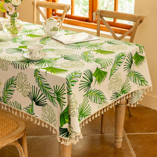 Nappe douce avec pompons en feuilles tropicales