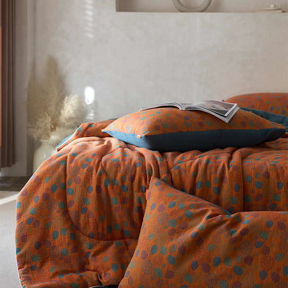Linge de lit confortable en gaze de coton avec motif de feuilles jacquard
