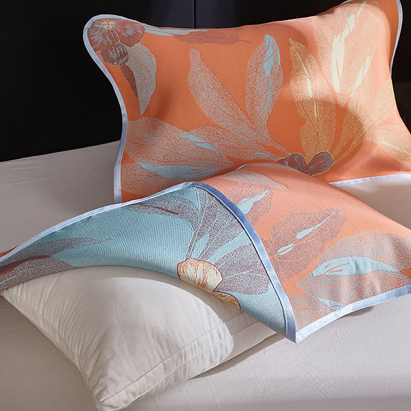 Couette réversible et respirante avec motif de feuilles jacquard