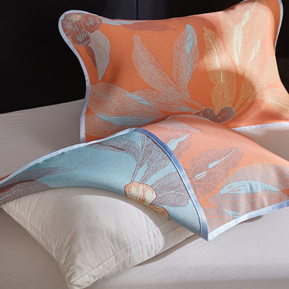 Couette réversible et respirante avec motif de feuilles jacquard