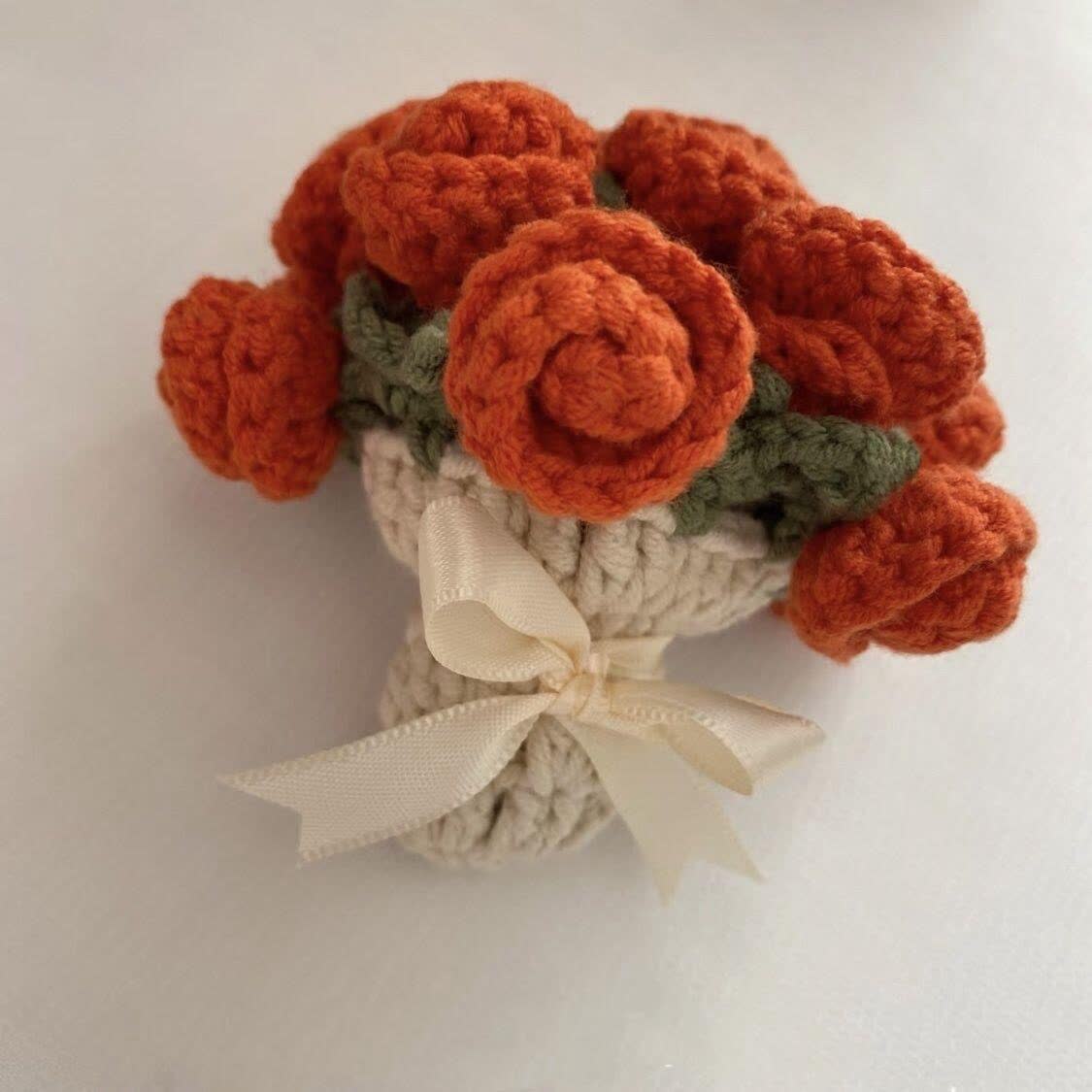 Dessous de verre crocheté fait main avec un bouquet de roses