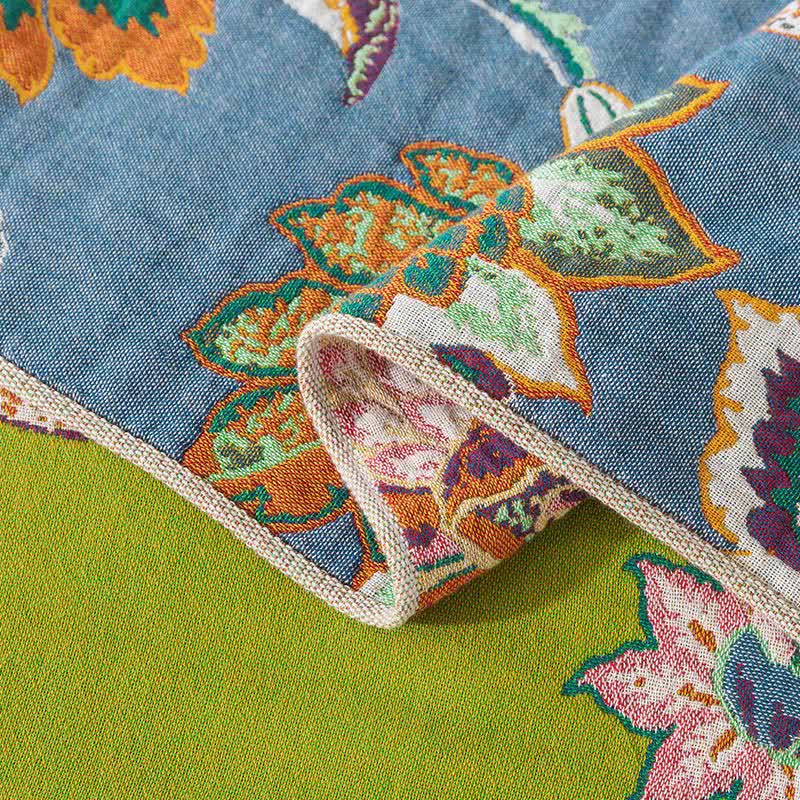 Couverture réversible colorée et florale en gaze de coton