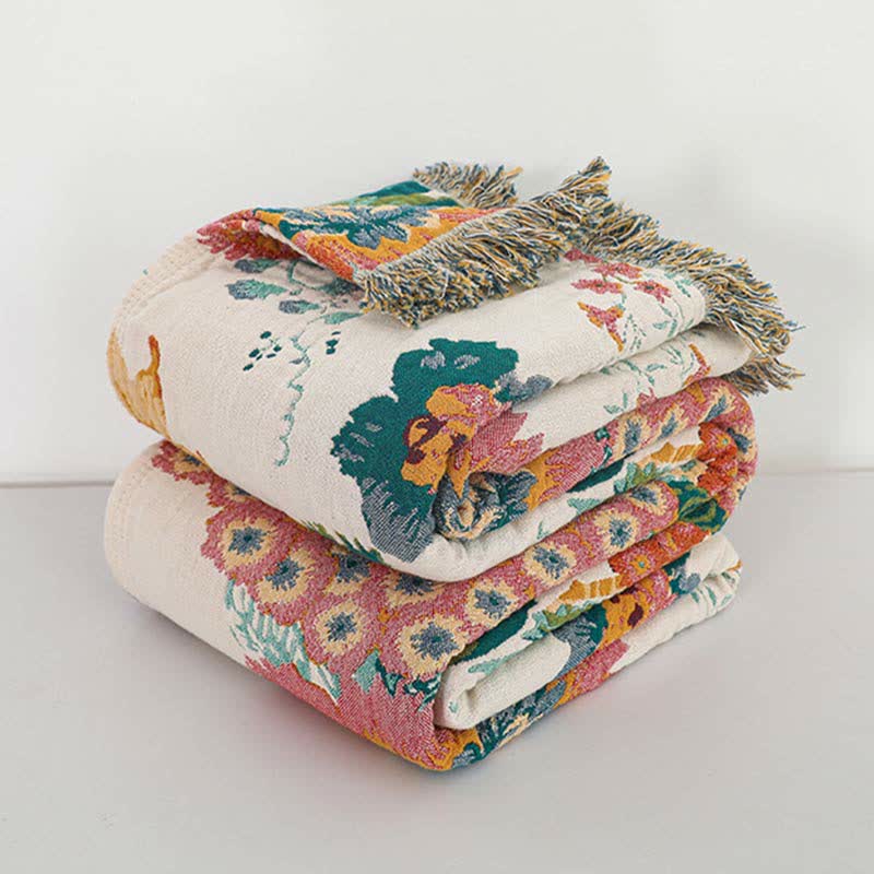Couette réversible en gaze de coton multicouche avec motif floral et pompons